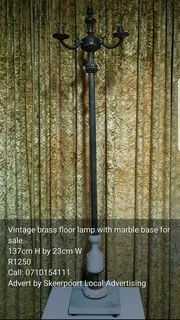 Vintage brass floor lamp with marble base for sale.