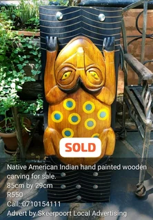 Large hand painted wooden Native American Indian carving for sale.