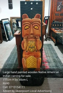 Large hand painted wooden Native American Indian carving for sale.