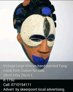 Vintage African hand painted Fang mask from Gabon for sale