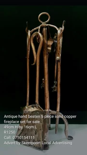 Antique hand beaten 5 piece solid copper fireplace set for sale.