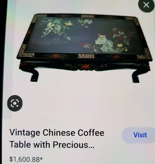 Vintage 1950s Chinese lacquer,carved relief coffee table with glass top for sale.