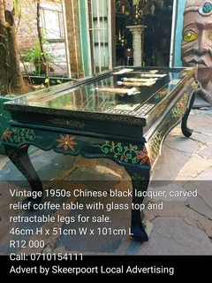Vintage 1950s Chinese lacquer,carved relief coffee table with glass top for sale.