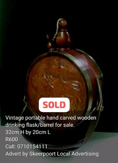 Vintage 1909 wooden barrel with brass tap and strapping on stand for sale