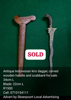 Antique Indonesian kris dagger, carved wooden handle and scabbard for sale