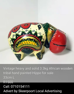 Vintage 3.3kg heavy and solid African wooden tribal hand painted Hippo for sale.