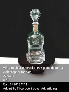Vintage clear pinched blown glass decanter for sale
