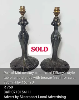 Pair of Mid century cast metal Tiffany's style table lamp for sale