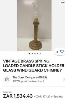 Vintage brass pair of spring loaded candle holders for sale