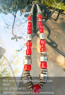 Aqua-turquoise detailed  resin Necklace For Sale.