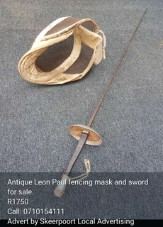Antique Leon Paul fencing mask and sword for sale