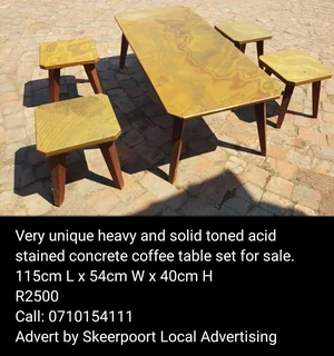 Very unique heavy and solid toned acid stained concrete coffee table set for sale