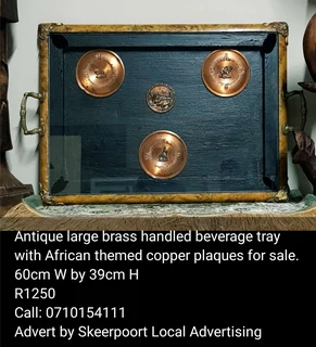 Antique large brass handled beverage tray with African themed copper plaques for sale