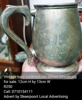 Vintage hard soldered can deluxe pewter jug for sale.