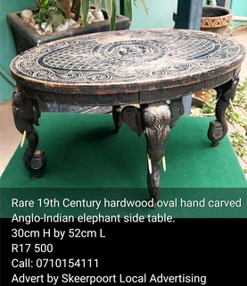 Rare 19th Century hardwood oval hand carved Anglo-Indian elephant side table for sale