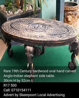 Rare 19th Century hardwood oval hand carved Anglo-Indian elephant side table for sale