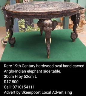 Rare 19th Century hardwood oval hand carved Anglo-Indian elephant side table for sale
