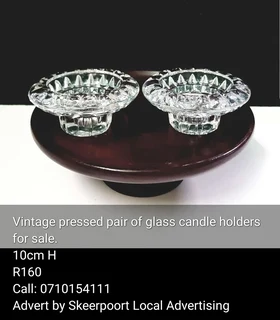 Vintage pair of pressed glass candle holders for sale.