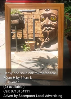 Heavy and solid oak mirror for sale.