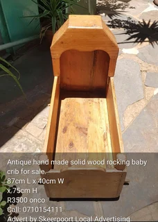 Antique hand made solid wood rocking baby crib for sale