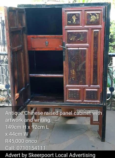 Antique Chinese raised panel cabinet with artwork and and writing for sale
