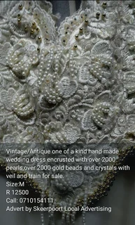 Antique/vintage one of a kind hand made wedding dress with veil and train for sale