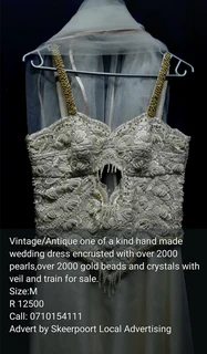 Antique/vintage one of a kind hand made wedding dress with veil and train for sale