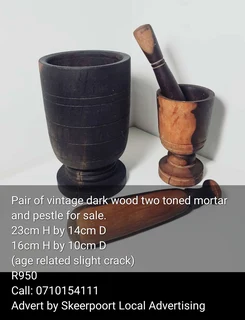 Pair of dark wood two toned mortar and pestle for sale