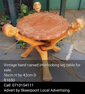 Vintage hand carved interlocking leg table for sale
