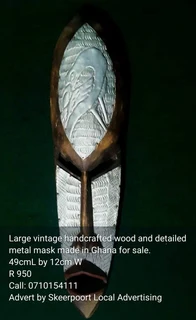Large vintage hand crafted wood and metal detailed mask made in Ghana for sale