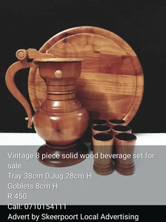Vintage 8 piece solid wood beverage set for sale.