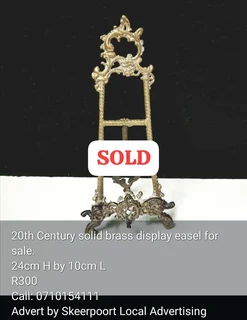 20th cenrury solid brass display easel for sale.