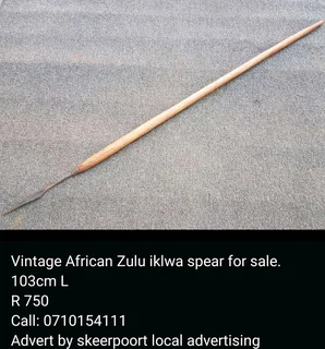 Vintage African Zulu double sided mask Iklwa spear for sale.