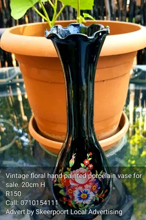 Vintage hand painted floral porcelain vase for sale.