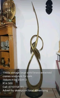 1960s vintage large solid brass cranes sculpture for sale.