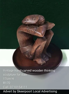 Vintage hand carved wooden thinking sculpture for sale.