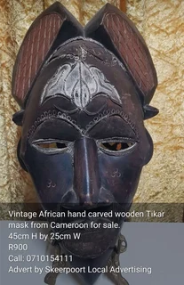 Vintage African hand carved Tikar mask for sale