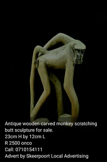 Antique wooden carved monkey butt scratching sculpture for sale.