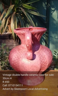 Vintage double handled ceramic vase for sale.