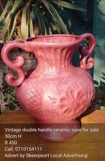 Vintage double handled ceramic vase for sale.