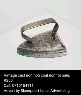 Vintage cast iron no5 coal iron for sale.