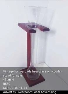 Vintage half yard Ale beer glass on wooden stand for sale