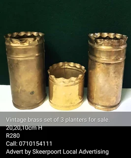 Vintage brass set of 3 planters for sale.