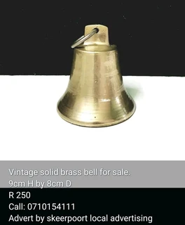 Vintage solid brass bell for sale.