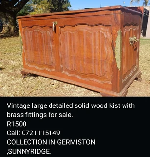 Vintage large detailed solid wood kist with brass handles for sale.