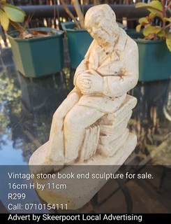 Vintage stone bookend scuplture for sale.