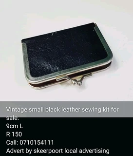 Vintage small black leather sewing kit for sale.