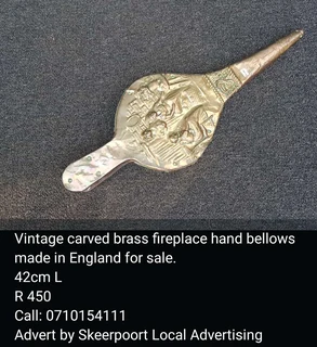 Vintage carvred brass fireplace bellows made in England for sale.