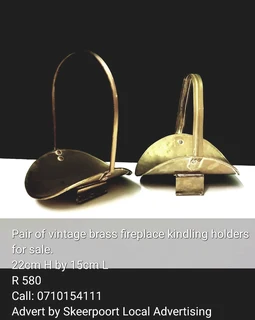 Pair of vintage brass fireplace kindling holders for sale