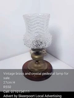 Vintage brass and crystal pedestal lamp for sale.